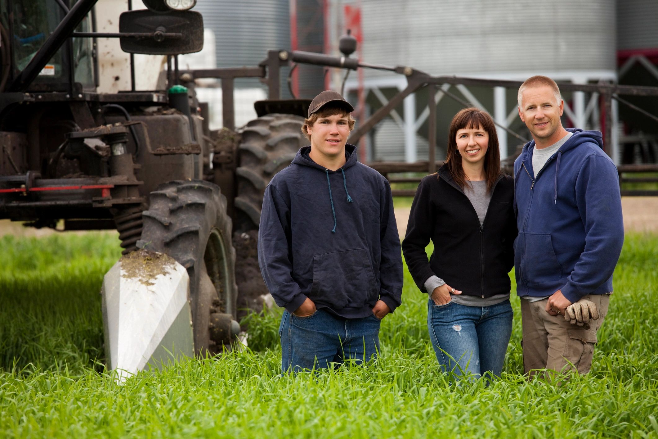 Farming couple with their son.
